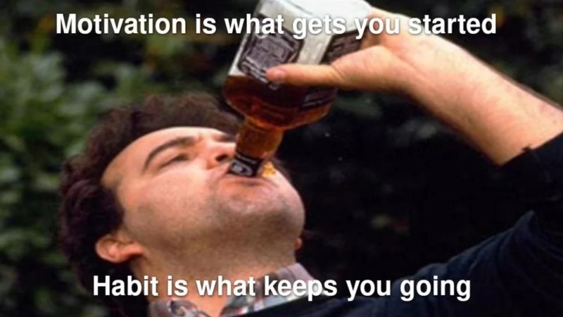 A fitness quote over the image of a man drinking a bottle of whiskey.