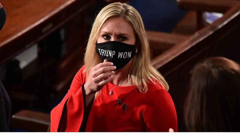 Marjorie Taylor Greene wearing a "Trump Won" mask in Congress.