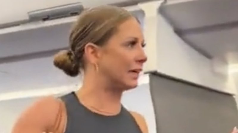 american airlines plane woman viral video