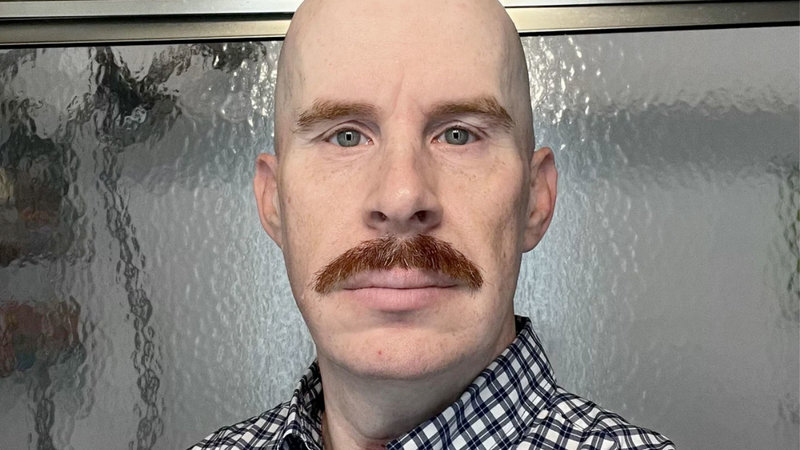 John Interview r/notinteresting bald guy with mustache meme.