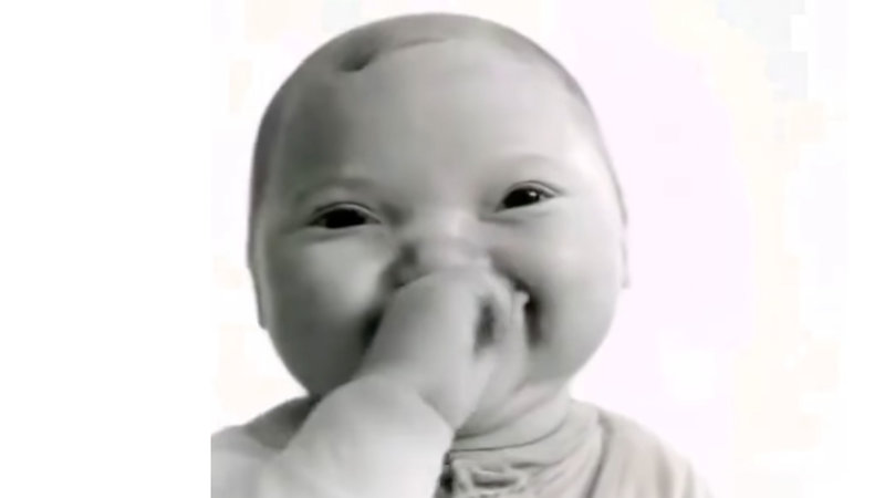 AI Baby Covering Mouth and Holding Laugh meme.