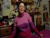girl in pink and purple shirt