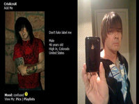 grown man with long emo bangs
