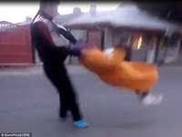 Romanian Thug Swings Elderly Woman