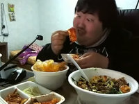 Fat asian guy loves his food