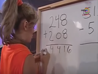 Girl At Whiteboard Adding