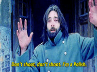 screenshot from the pianist of adrian brodie holding his arms up with the caption "don't shoot, don't shoot. i'm a polish." 