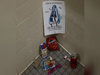 Bathroom Shrines trend depicting an example with a "Miku Corner" in a bathroom surrounded by offerings of food and drinks.