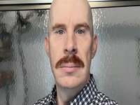 John Interview r/notinteresting bald guy with mustache meme.