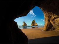 Windows 10 Wharariki Beach Cave Wallpaper image.