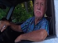 A screenshot of the "lock em up" video and meme.
