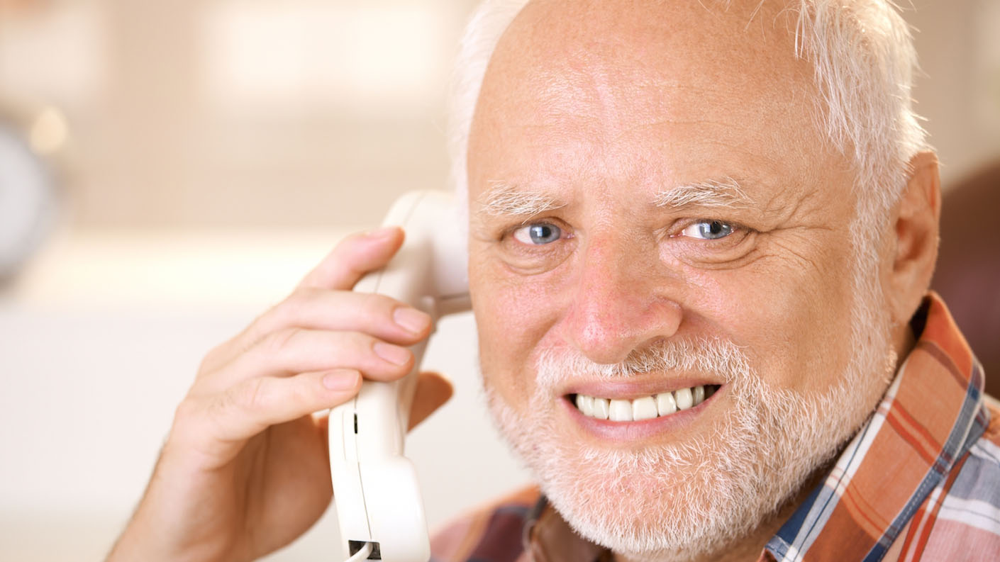 Hide The Pain Harold meme and stock photo.