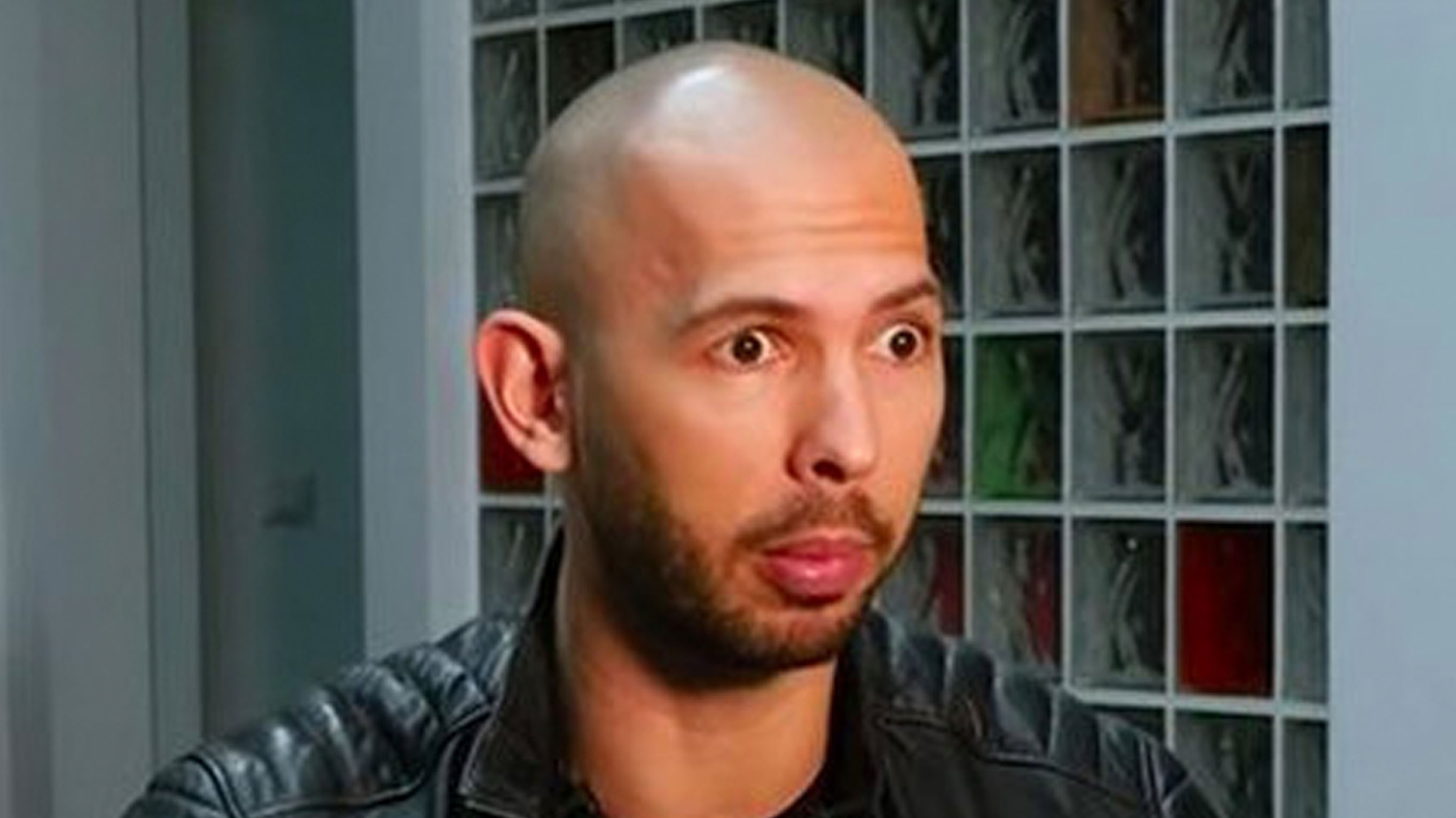 Andrew Tate Shocked Face Wide Eye meme.