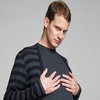 Daniel Tosh holding his own chest