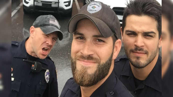 Photo of three "hot cops" helping in Hurricane Irma