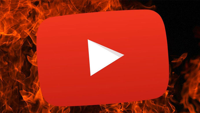 YouTube red play button logo with foregrounding flames.