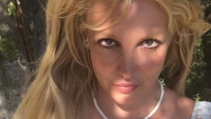 Britney Spears under a tree