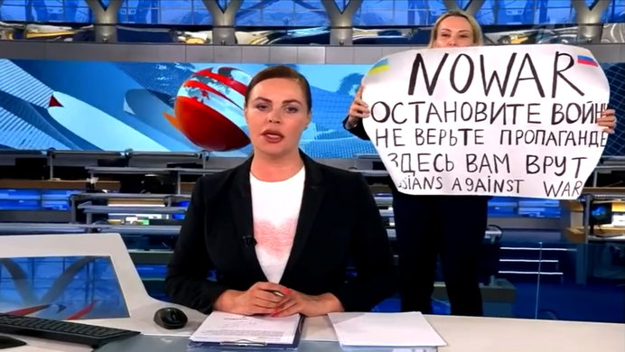 Channel One Russia producer Marina Ovsyannikova interrupts news broadcast with an anti-war poster