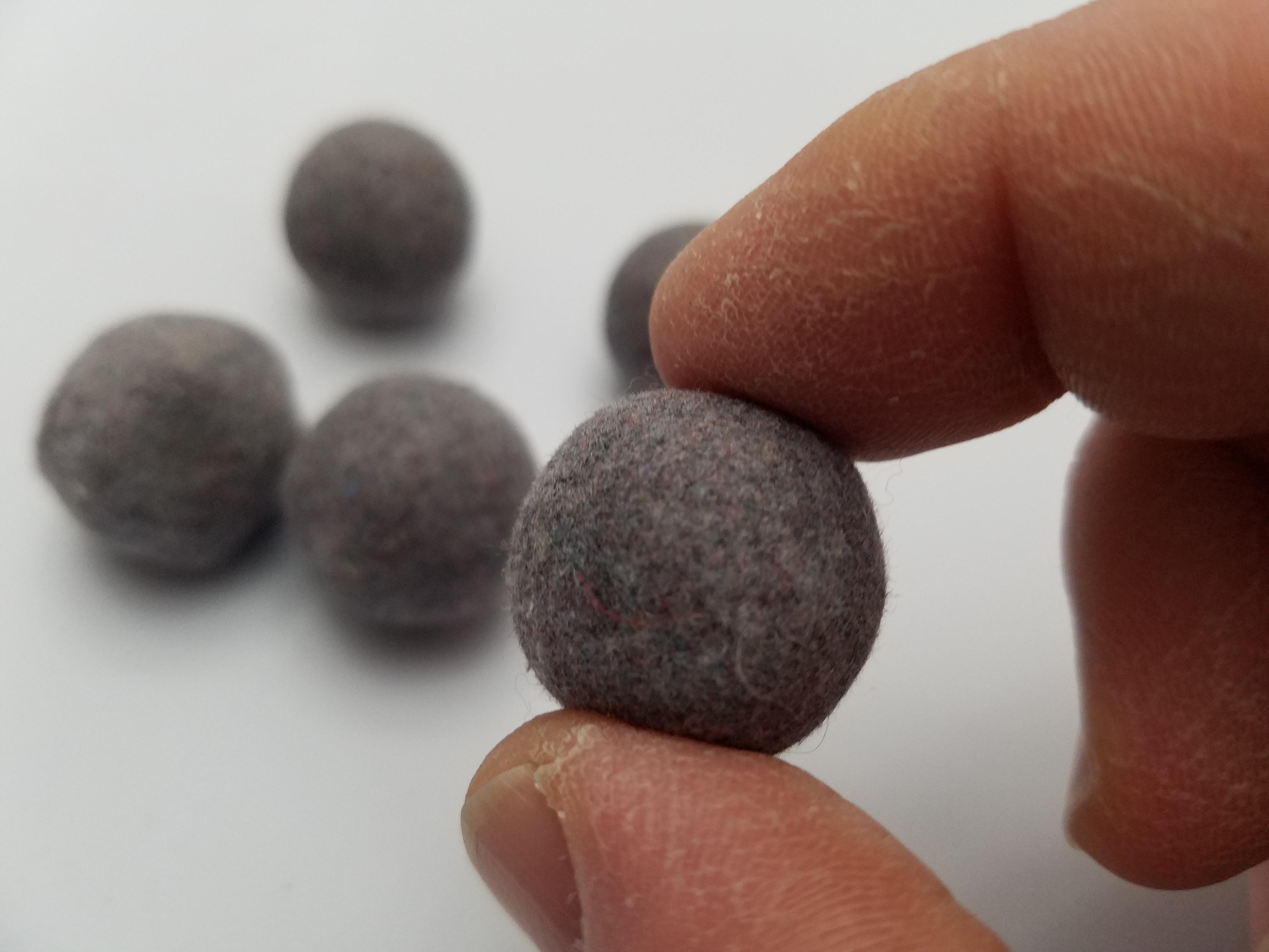 My dryer has started producing these perfectly round lint balls /r