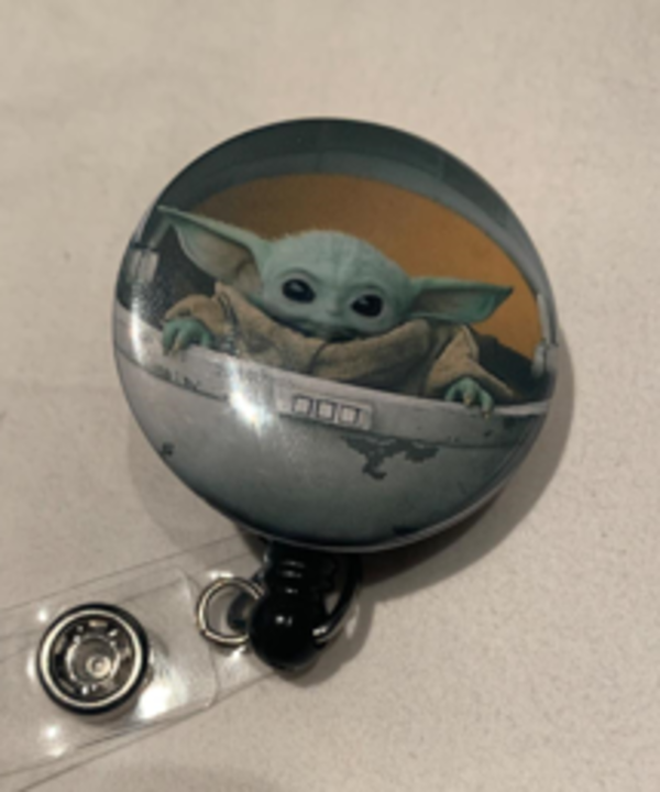 Just bought this super adorable baby yoda butterfly badge reel /r