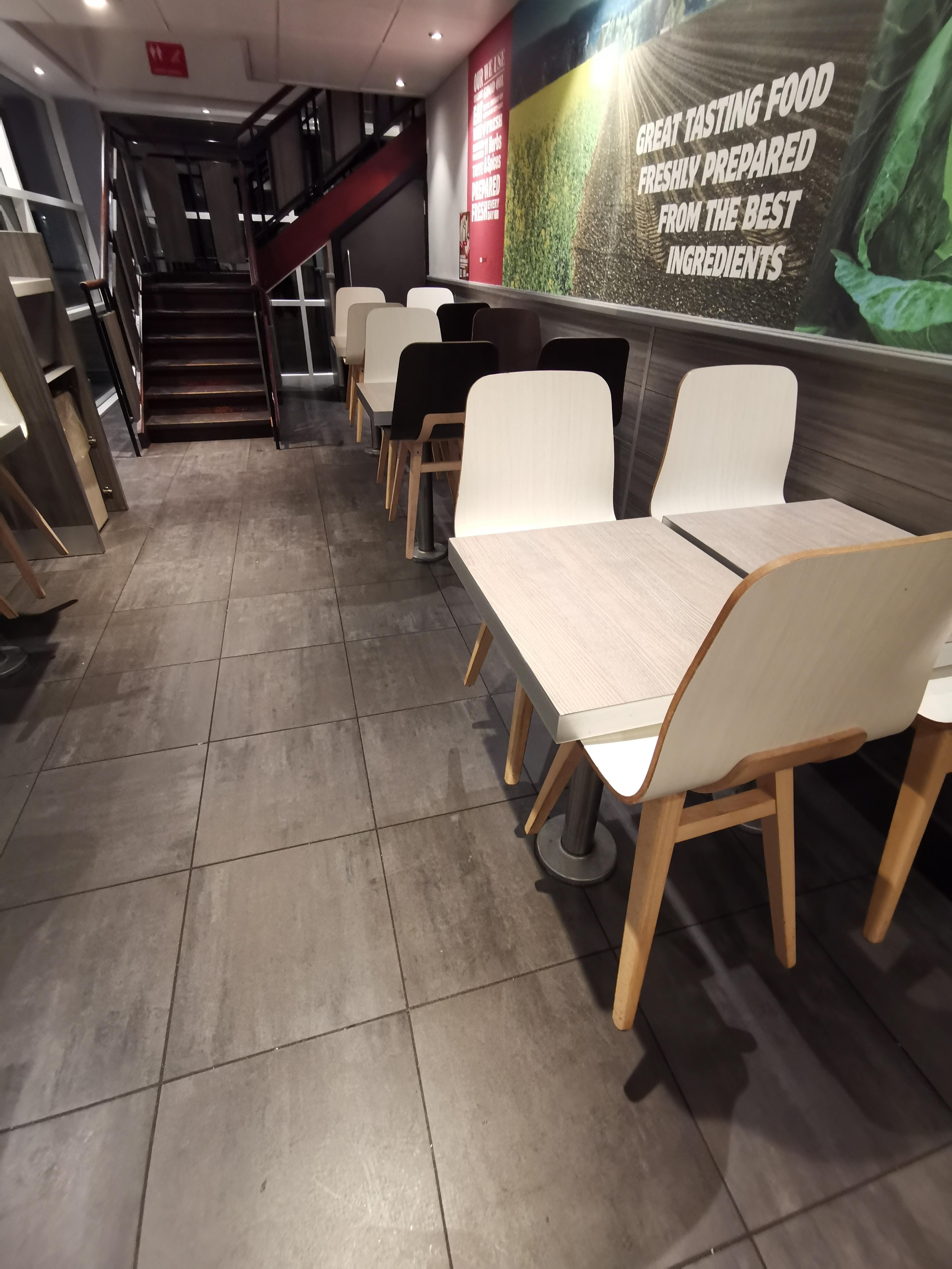 This Kfc Has Chair Holders Under The Table So The Workers Can Clean The Floor Easily Without Having To Dirty The Tables By Putting Them On Top R Mildlyinteresting Mildly Interesting