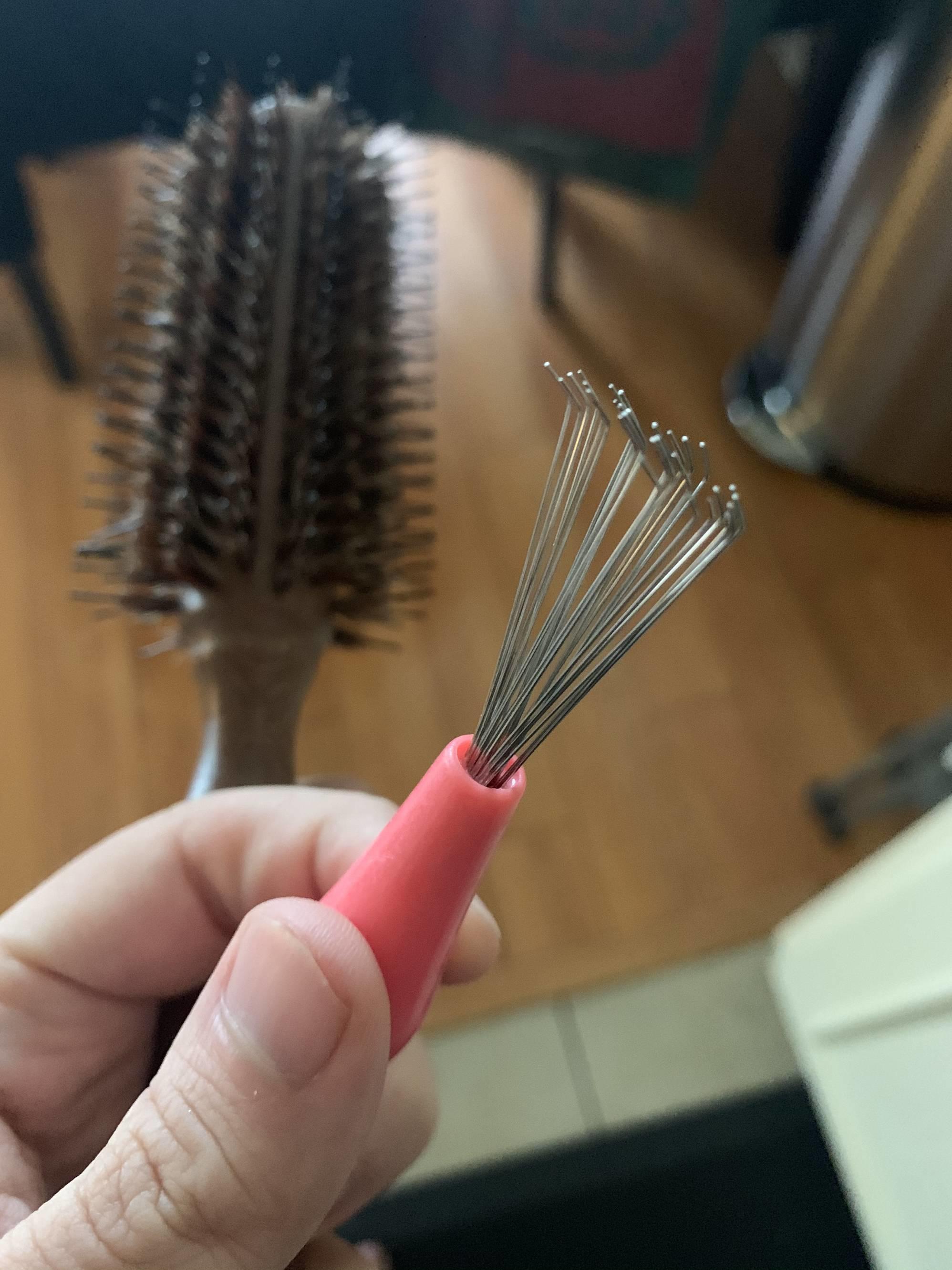 This hairbrush I bought came with a tool to remove hair from the brush
