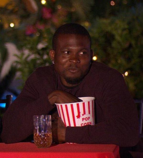 Invest in Love Island guy reaching for popcorn /r/MemeEconomy Know Your Meme