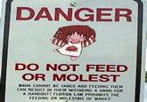 DANGER DO NOT FEED OR M----- WAHA CANNOT BE TAMED AND FEEDING THEM CAN RESULT IN THEIR MISTAKING A HAND FOR A HANDOUTI FLORIDA LAW PROHIBITS THE FEEDING OR MOLESTING OF WAHA!