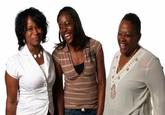 three black women laughing