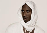 2kobe-bryant-white-hood2.jpg Kobe Bryant posing wearing a white hot outfit including some kind of head covering - image was made into a photoshop meme