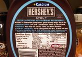 +CALCIUM HERSHEYS SYRUP SPECIALLY FORTIFIED WITH VITAMINS AND MINERALS. HERSHEYSe Chocolate Syrup tastes great in many ways. Use it for: CHOCOLATE BAILK: Stir 2 to 3 tablespoons into 8 az. of cold mil. DESSERTS: Pour over ice cream, cakes and other desserts. RICH HOT CHOCOLATE: Stir 2 tablespoons into oz. of milk and heat. FOR DELICIOUS RECIPES. FUN ACTIVITIES. COOLDOWNLOADS AND MORE. VISIT US AT www HERSHEYSKITCHENS.COM Nutrition Facts Total Fat t 0% Filer 1 g 4% Saturated Fat 0· Trats Fat g Dietary Supas 1 1% Vitamin A 0% 'Zinc 12 NGREDIENTS: HIGH FRUCTOSE CORN SYRUP: COR SYRUP WATER COCOA SUGAR CONTAINS2% DRLESS OF TRICALCIUM PHOSHATE POTASSIUM SORB PRESERVATIVE: SALT, MOND AND DIGL YERES