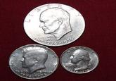 Coin Evolutions Coin on the top is an Eisenhower dollar
Bottom left is a half dollar
bottom left is, of course, a quarter