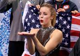 SOCHI, RUSSIA - FEBRUARY 08: Ashley Wagner of the United States waits for her score with teammates and coaches during the Figure Skating Team Ladies Short Program during day one of the Sochi 2014 Winter Olympics at Iceberg Skating Palace on February 8, 2014 in Sochi, Russia.  (Darren Cummings / Pool / Getty Images)