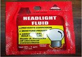 AGS HEADLIGHT FLUID ·PREVENTS CORROSION MOISTURE PROOR ASSUF EAS BULB 2AL Seals & Protects al electrical Net W: 4 gm HERE 14 02.