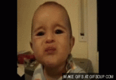 Source: http://gifsoup.com/view/408927/baby-eating-lemon.html