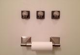 Real-world bathroom toilet paper with the 3 seashells visible and present