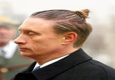 Putin with Man Bun "Source":http://storage.designcrowd.com/design_img/1492357/179864/179864_7572887_1492357_9e48b0d8_image.jpg