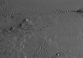 "Source":http://pluto.jhuapl.edu/soc/Pluto-Encounter/view_obs.php?image=029917/lor_0299179742_0x636_sci_2.jpg&utc_time=2015-07-14%3Cbr%3E11:37:03%20UTC&description=[not%20yet%20coded]&target=PLUTO&range=0.0M%20km&exposure=10%20msec&imgType=approved