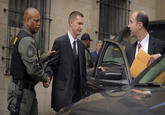"source":http://www.baltimoresun.com/news/maryland/freddie-gray/bs-md-ci-nero-verdict-20160521-story.html

Baltimore City police officer Edward Nero, center shakes hand with Sheriff Lt. D.C. Moore, left, as he leaves Courthouse East after he was found not guilty of all charges relating to the death of Freddie Gray last year.

Photo credit: Kenneth K. Lam, Baltimore Sun

