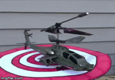 Helicopter Takes Off From Top Of Dog's Head Made this gif, but credit goes to the original creator.
<iframe width="560" height="315" src="https://www.youtube.com/embed/ZVboVv59fLQ?ecver=1" frameborder="0" allowfullscreen></iframe>