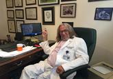 Dr. Harold Bornstein at his desk