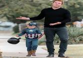 Chris Pratt gesturing jokingly as his kid is dressed as "Captain America":/memes/subcultures/captain-america in what appears to be "Halloween":/memes/events/halloween
