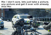 Photo taken off "eBaum's World":/memes/sites/ebaums-world article that was a list of "40 good pics":http://www.ebaumsworld.com/pictures/40-choice-cool-pics-to-help-kill-your-work-time/85715684/ of a motorcycle taking a very aggressive and tight shot for a movie, with multiple rigs all over the place and police in the background of some exotic location with water, with caption about how taking a "selfie":/memes/selfie can be a nonchalant and a very hands-on experience. 