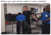 Christopher Walken being checked by airport security in a picture that has a "TMZ":/memes/sites/tmz watermark on it, with caption referencing the "Needs More Cowbell":/memes/needs-more-cowbell meme catchphrase from years ago.