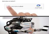 Edited image of a "Boston Dynamics":/memes/subcultures/boston-dynamics robot holding a severed hand to tap on the I AM NOT A ROBOT checkbox.