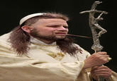 Pope with a red neck mullet head