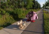 3D rendered Bimpson walking two dogs