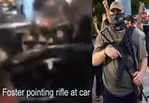 Images taken from Facebook video of the shooting, and previous photo of Garrett wearing the same clothes. This view of Garrett occurs a second before the shooting starts and can be seen if paused in HD. It seems to show him pointing a black object like a rifle toward the driver's window. Other frames show the rifle in motion, as though he was turning the safety off.
unknown repost.