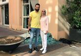 The "bride that was in the middle of a photo shoot":/videos/223002-2020-beirut-explosion of her wedding dress that got interrupted by the massive shock wave is fine and seen here with her groom after the street had been swept of broken glass and debris 