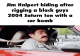 Jim Halpert hiding after rigging a black guys 2004 Saturn lon with a car bomb